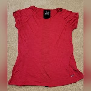 Women's large Nike Dri-fit red & black athletic tooSmall hole in where tag was